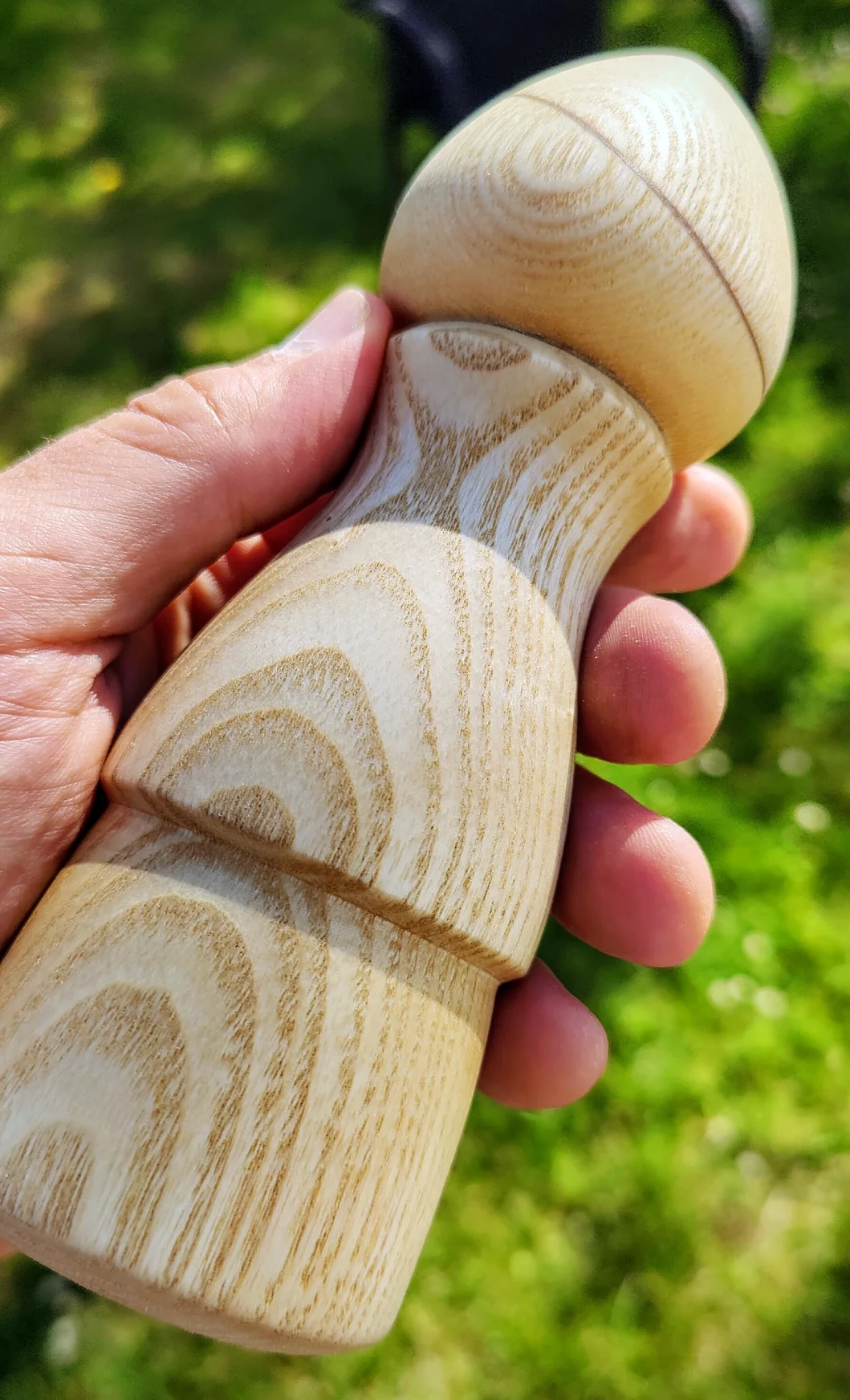 small pepper grinder made from light wood