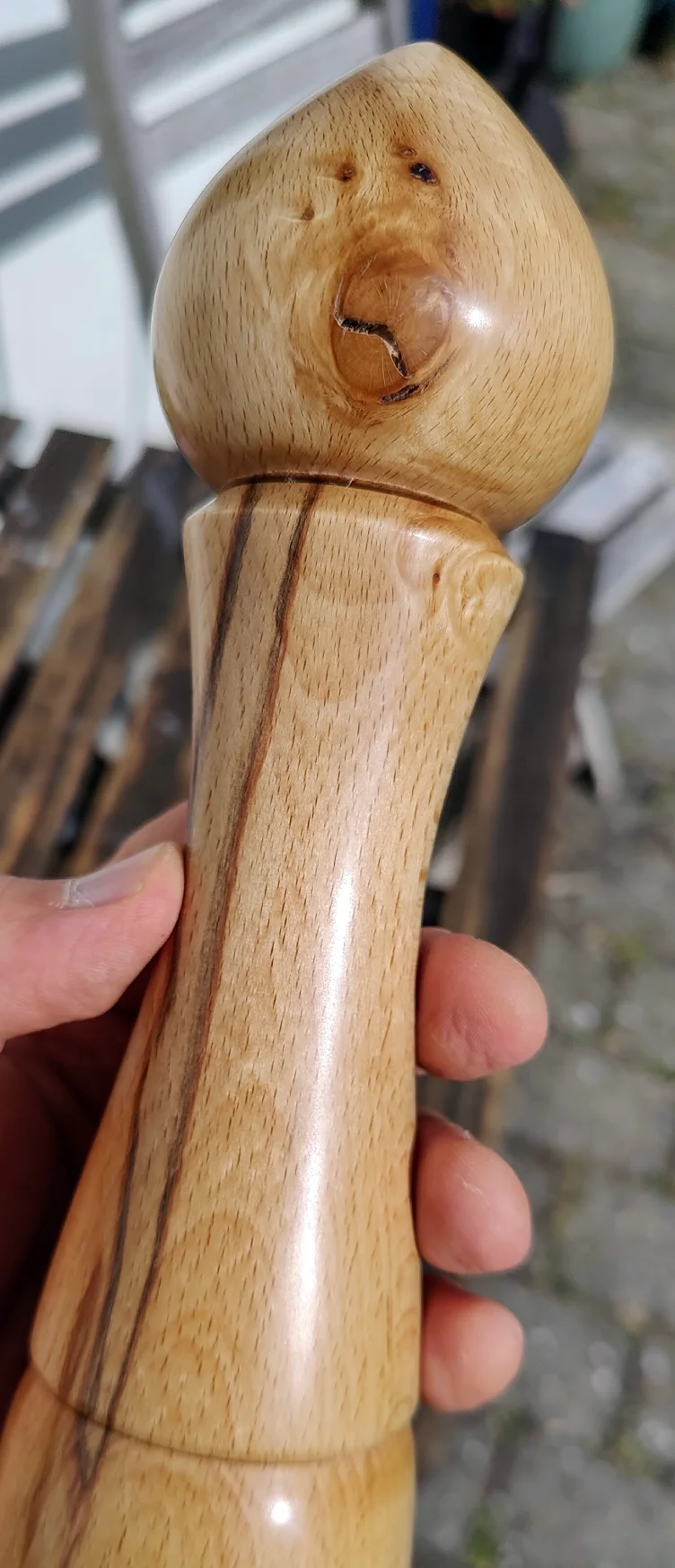 beech pepper grinder with a knot and miscolored wood