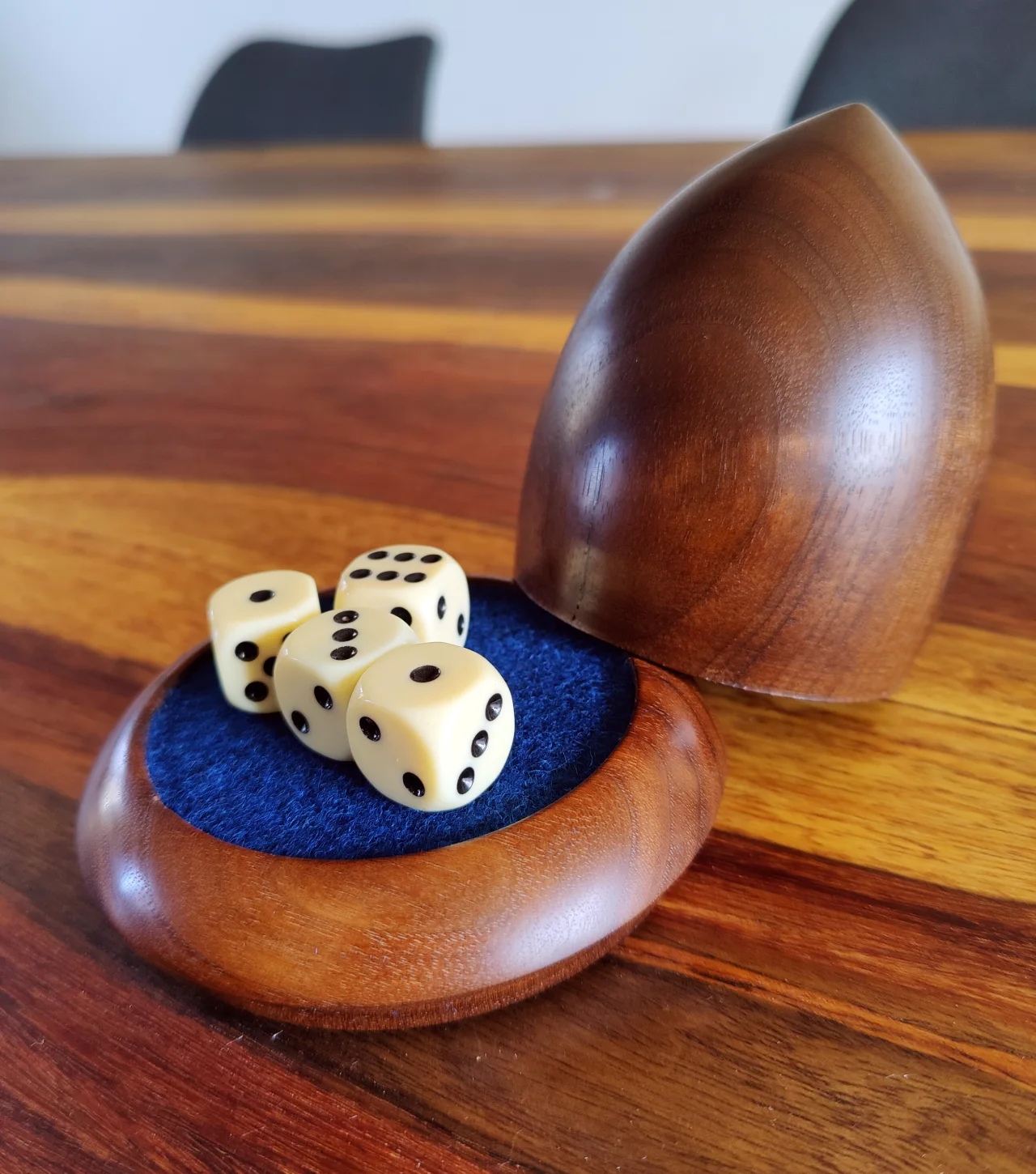 Raffle cup made from walnut with blue felt
