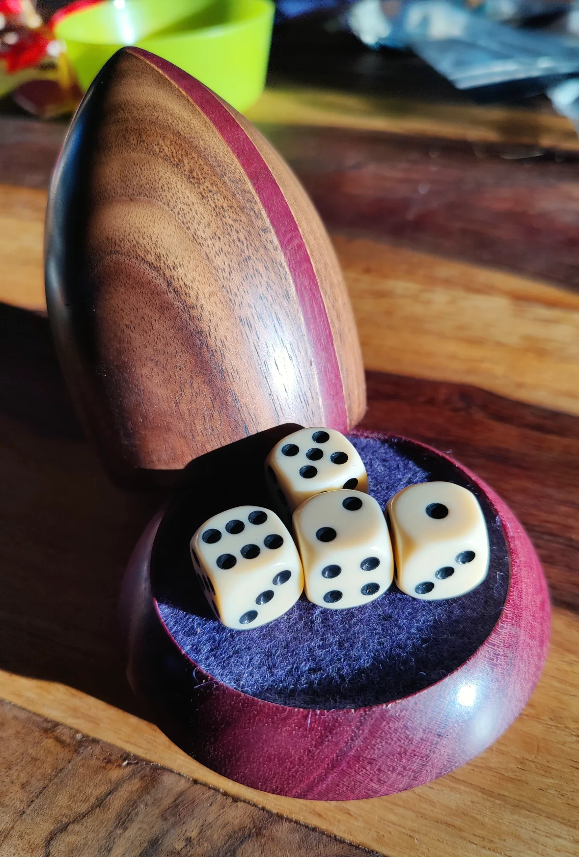 raffle cup with amaranth detail. 4 dice